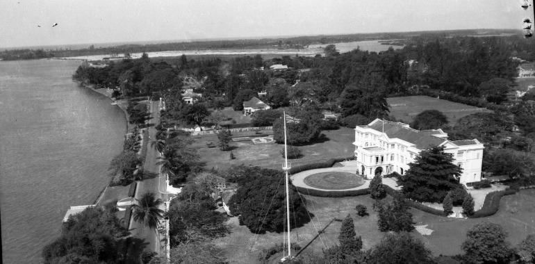 Baba GOVERNMENT (STATE) HOUSE MRINA LAGOS,WITH MARINA STREET AND THE LAGOON IN THE FOREGROUND.BUILT IN 1896,WAS THE OFFICIAL RESIDENCE OF THE COLONIAL GOVS.GENERAL